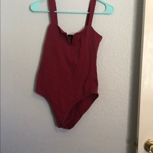 Rusty red body suit